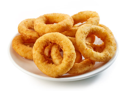 plate of fried onion rings isolated on white backgroundの写真素材