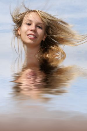Women, portrait, girl, face, beauty, blond hair, wind, long hair, light, water, reflection, bath,の写真素材