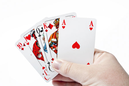 Right hand holding cards - straight in poker gameのeditorial素材