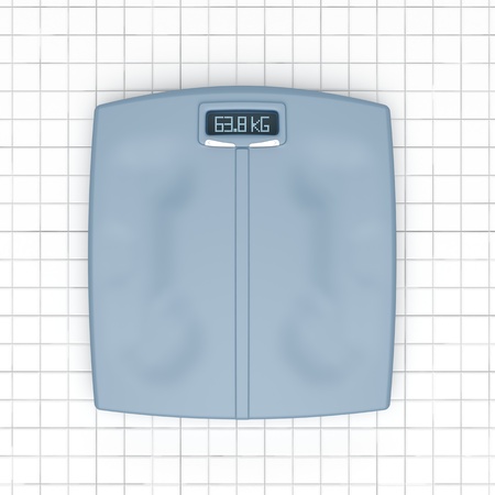Bathroom weight scale on white tiled floorの写真素材