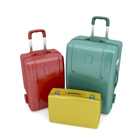 Two travel bags and one briefcase in different colorsの写真素材