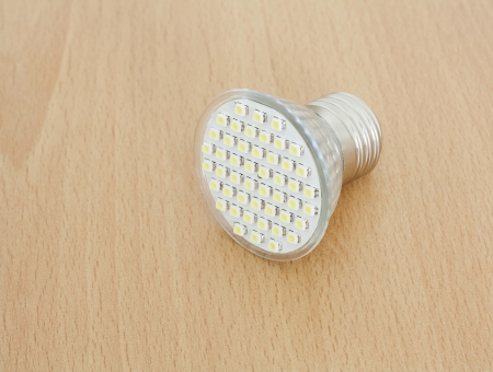 LED bulb on wooden backgroundの写真素材