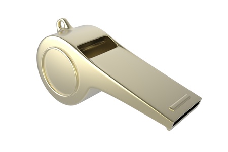 Golden whistle isolated on whiteの写真素材