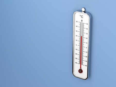 Classic thermometer attached on blue wall