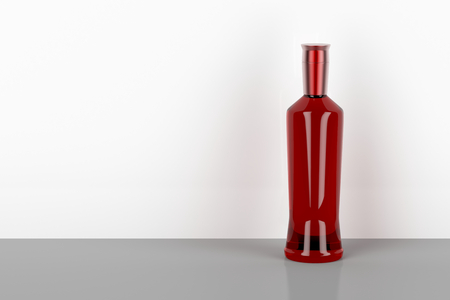 Red bottle for liqueur, vodka or ginの写真素材