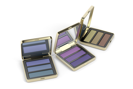 Different eye shadows in gold boxes on white backgroundの写真素材