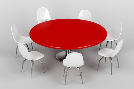 Conference round table and white plastic chairs in meeting room on grey backgroundの写真素材