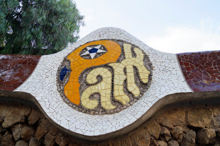 BARCELONA, SPAIN - OCTOBER 08, 2015: Mosaic sign of Park Guell in Barcelona, Spain, designed by famous architect Antoni Gaudiのeditorial素材
