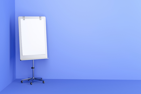 Blank flip chart in blue colored office roomの写真素材