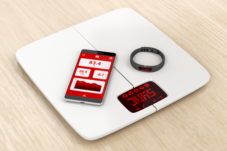 Smart body analyzer, smartphone and activity tracker, synced togetherの写真素材