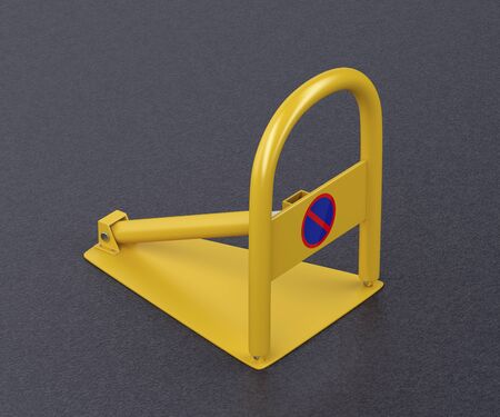 Yellow parking lot barrier on the asphaltの写真素材