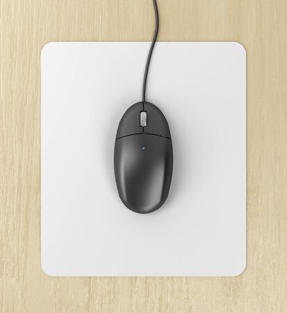 Black computer mouse on a mouse pad, top view
の写真素材