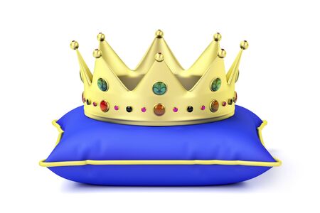 Royal gold crown on blue pillow, front viewの写真素材