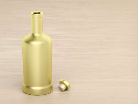 Gold bottle for alcoholic beverage on wood tableの写真素材