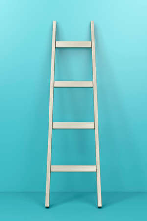 Wooden ladder leaning against the wallの写真素材