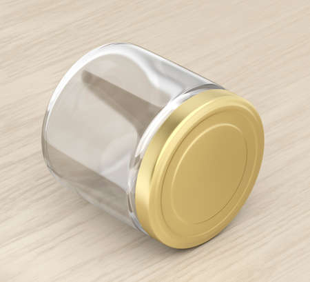 Empty glass jar on the wood tableの写真素材