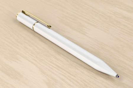 White pen on wooden desk