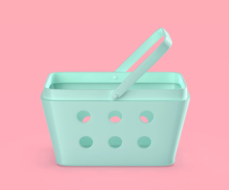 Empty plastic shopping basket on pink background, side viewの写真素材