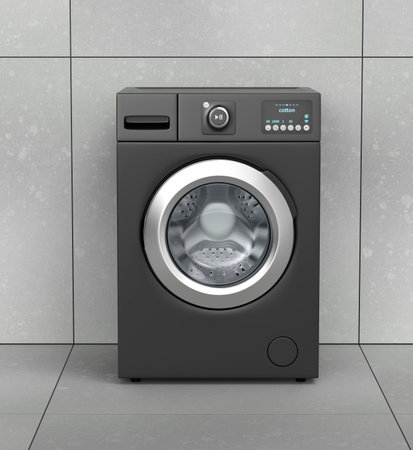 Black washing machine in empty laundry roomの写真素材