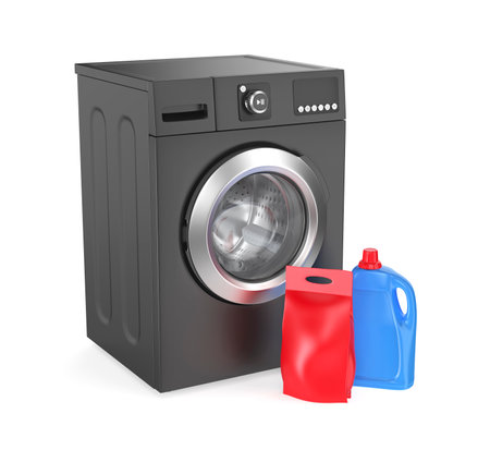 Red washing powder bag and blue liquid detergent bottle in front of black washing machineの写真素材