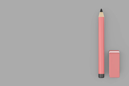 Top view of a pencil and an eraser on a grey backgroundの写真素材