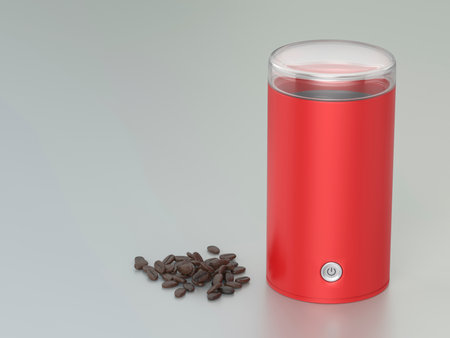 Pile of coffee beans next to red electric coffee grinder on grey metal backgroundの写真素材
