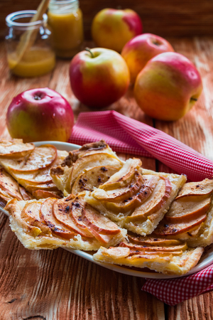 Pie: apple pie and apples on the wooden backgroundの写真素材