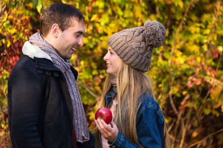 Young couple in love outdoor. Happy people in love walking in the woods hugging each other, having a spring mood and enjoying life.の写真素材