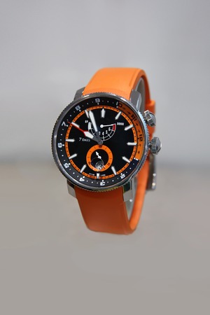 Swiss watches on gray background floating in the air. Product photography