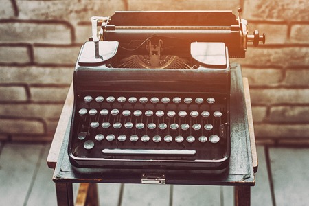 Antique typewriter. Vintage typewriter machine closeup retro styledの写真素材