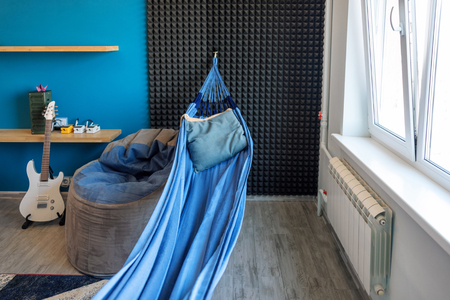 Living room with a hammock in modern styleの写真素材