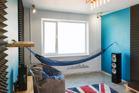 Living room with a hammock in modern styleの写真素材