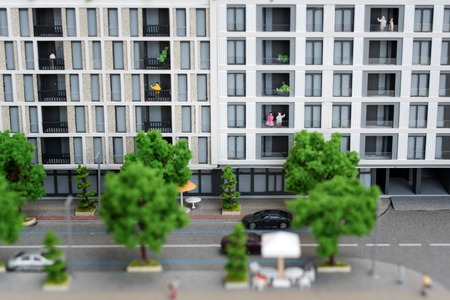 Miniature model, miniature toy buildings, cars and people. City maquette.の写真素材