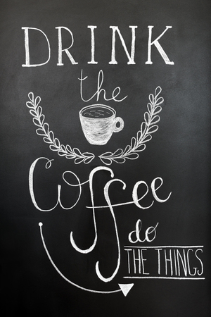 Drink the coffee, do the things. Typography poster, wall art print. Chalk lettering on the blackboard. Quote about coffee.の写真素材
