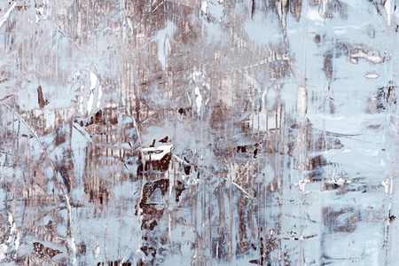 Old grungy wall texture. Peeling stained surface background. Texture of old rustic wall.の写真素材