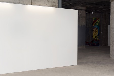 White wall with lamps in loft interior. Modern art galleryの写真素材
