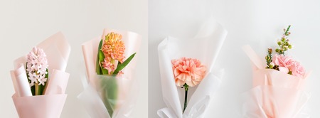Spring flowers. Fresh bouquets with hyacinth and carnation in minimal style on light background. Top view, spring flat lay. Love and gift concept. Long bannerの写真素材