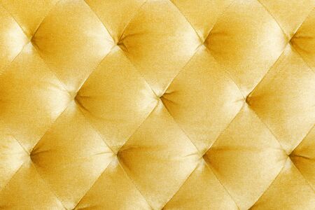 Luxury velour quilted sofa upholstery, home decor texture or background. Furniture design, classic interior and royal vintage material concept.の写真素材