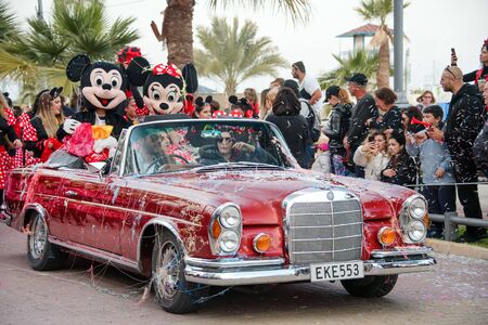 LIMASSOL, CYPRUS - MARCH 9, 2019: Grand carnival parade, people in costumes at famous traditional...