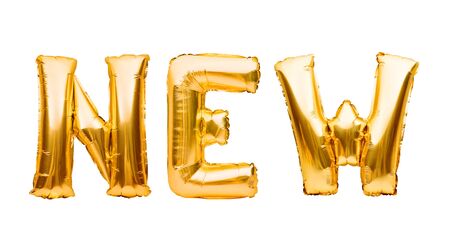 Word NEW made of golden inflatable balloons isolated on white background. Helium balloons gold foil forming word new. Startup, grand opening celebration. Business beginnings event conceptの写真素材