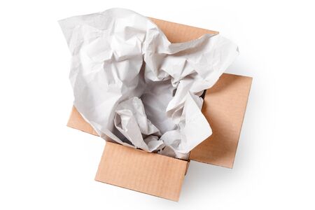 Open empty rectangular cardboard box with wrapping paper isolated on white background. Mockup for design and advertising. Brown craft paper or carton box mock up. Delivery packaging mock up.の写真素材