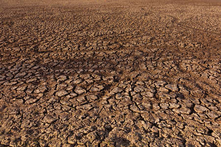 Cracked and dry earth in the desert Global warming and shortage of water on the planet concept....