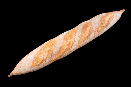 Freshly baked homemade bread isolated on black. French bread baguette. Healthy eating and traditional bakery, baking bread concept.の写真素材