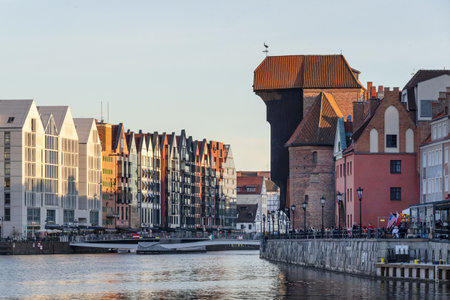 Gdansk, Poland - May 22, 2022: Old town of Gdansk at Motlawa river, Poland, evening light. Cityscape of Gdansk, view across the riverのeditorial素材