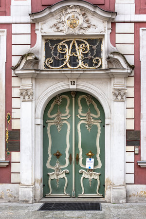 Gdansk, Poland - May 22, 2022: Entrance doors into the Uphagen house (Polish: Dom Uphagena) at Long street in Gdansk Old Town. Vintage reconstructed 18th-century merchant house.のeditorial素材