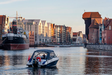 Gdansk, Poland - May 22, 2022: Old town of Gdansk at Motlawa river, Poland, evening light. Cityscape of Gdansk, view across the riverのeditorial素材