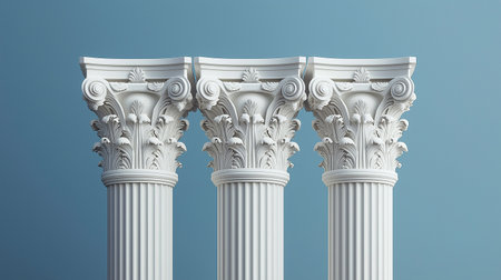 Three white Ionic columns featuring elaborate decorative carvings at their capitals, exemplifying classical architectural design with detailed motifs. Elegance and historical artistry concept.の素材