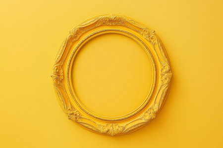 Baroque yellow round ornate frame with an elegant flower motif background. A detailed yellow vintage round frame with floral ornamentation on a matching background. Mockup with copy space for text.の素材