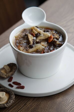 Easy vegetarian menu hot mushroom  soup with ingredientの写真素材