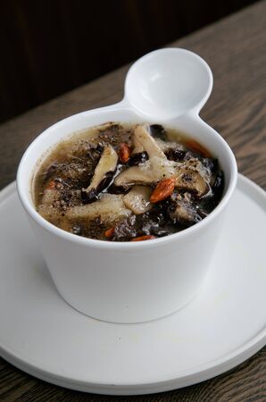 Easy vegetarian menu hot mushroom  soup with ingredientの写真素材